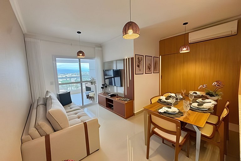 Apto varanda gourmet vista mar e serra. Ar cond.