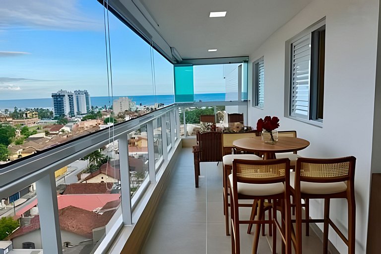 Apto varanda gourmet vista mar e serra. Ar cond.