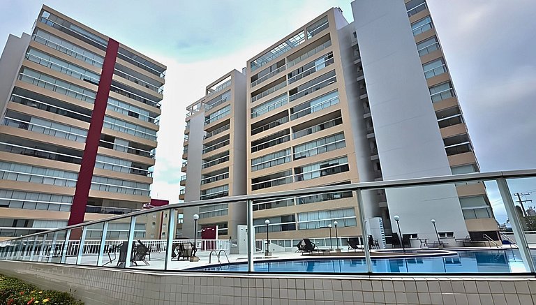 Apto varanda gourmet vista mar e serra. Ar cond.